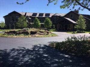 A photo of the finished asphalt driveway at the Suzanne and Walter Scott Foundation.